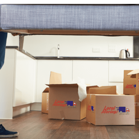 A man standing in front of boxes in a living room, BOOk 2 HOURS NOW: Packing and unpacking (3 Movers & Tools only)